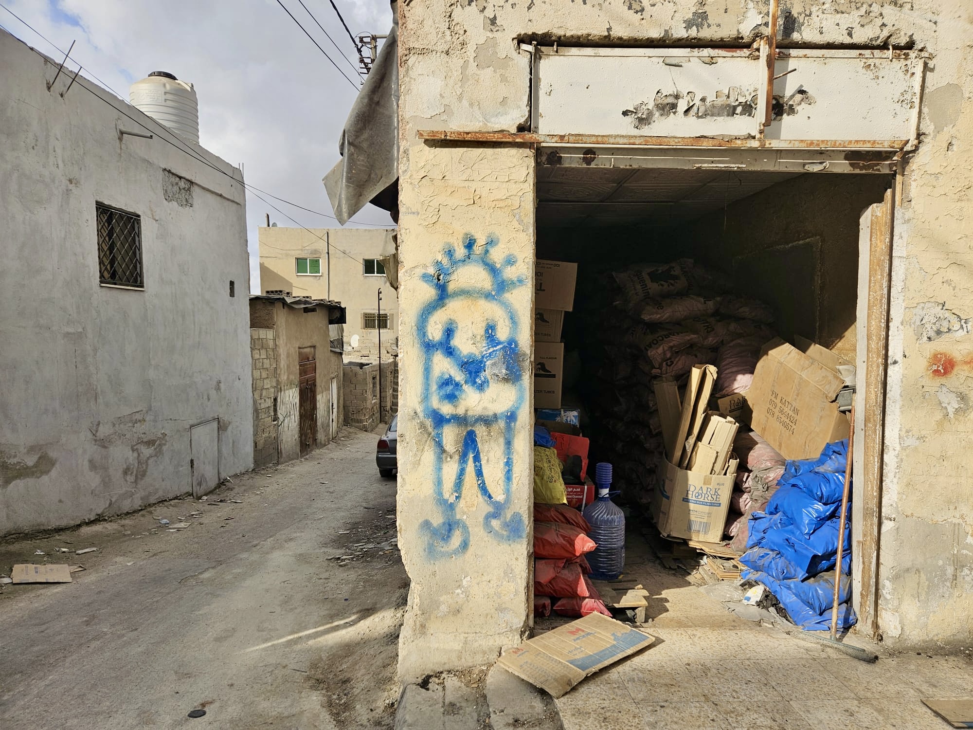 Un graffito di "Handala", il celebre personaggio del fumettista palestinese Al-Ali Naji